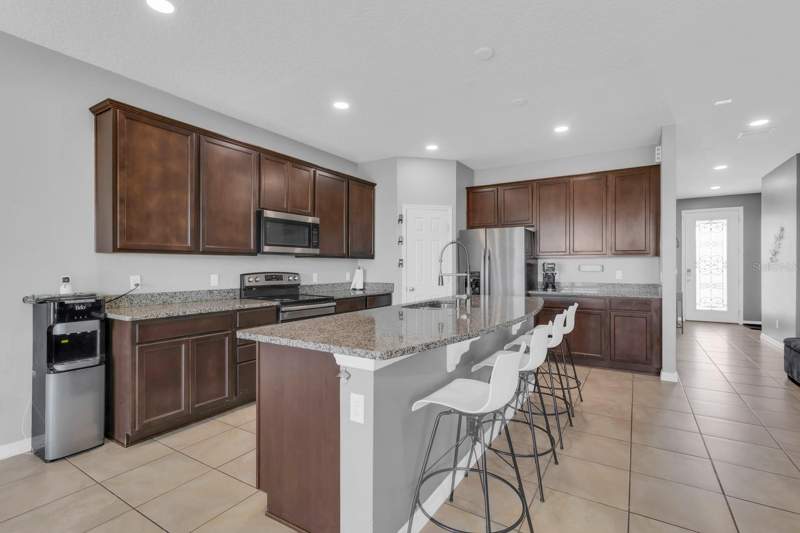 5 bedroom Single Family Residence at 2172 Bur Oak Boulevard, Live Oak Lake Ph 1, St Cloud — photo 4