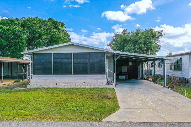 2 bedroom Manufactured Home at 6450 HOLLYBERRY LANE, BROOKHAVEN VILLAGE, WINTER HAVEN — photo 1