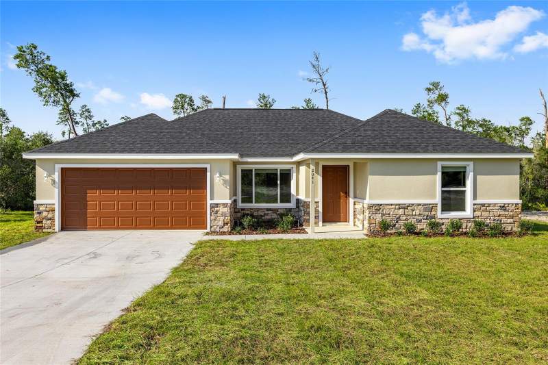 4 bedroom Single Family Residence at 22060 SW Neptune Boulevard, Rainbow Lakes Estate, Dunnellon — photo 3