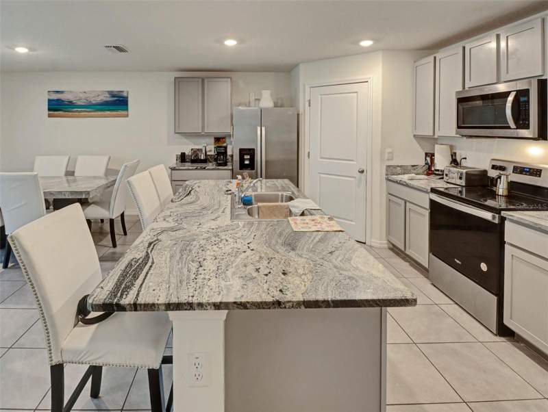 4 bedroom Single Family Residence at 1202 Tahitian Sunrise Drive, North Park Isle Ph 1B 1C & 1D, Plant City — photo 5