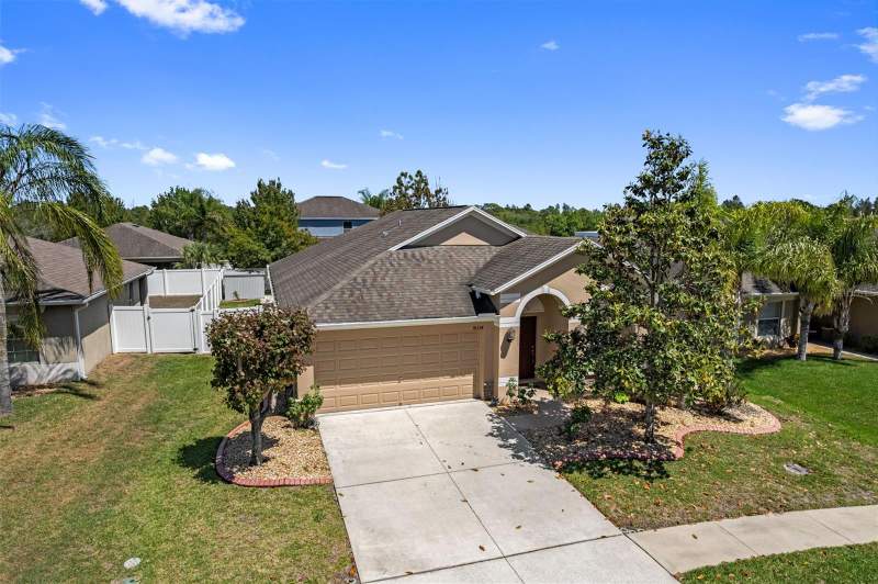 4 bedroom Single Family Residence at 18334 Waydale Loop, Briar Oaks Village 01, Hudson — photo 2