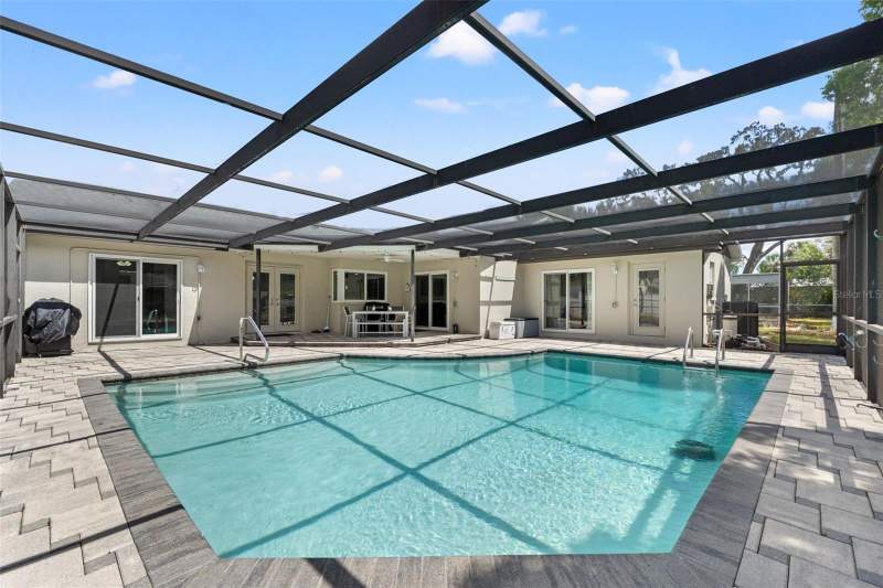 4 bedroom Single Family Residence at 8392 Camphor Drive, Forest Oaks, Spring Hill — photo 4