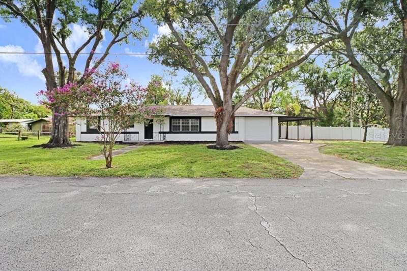 12113 MIDLAKE DRIVE home for sale in Tampas North Side Country Clu