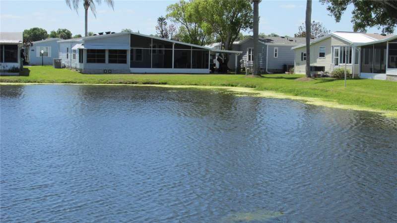 2 bedroom Manufactured Home at 91 STRAPHMORE DRIVE, SWEETWATER GOLF & TENNIS CLUB, HAINES CITY — photo 2