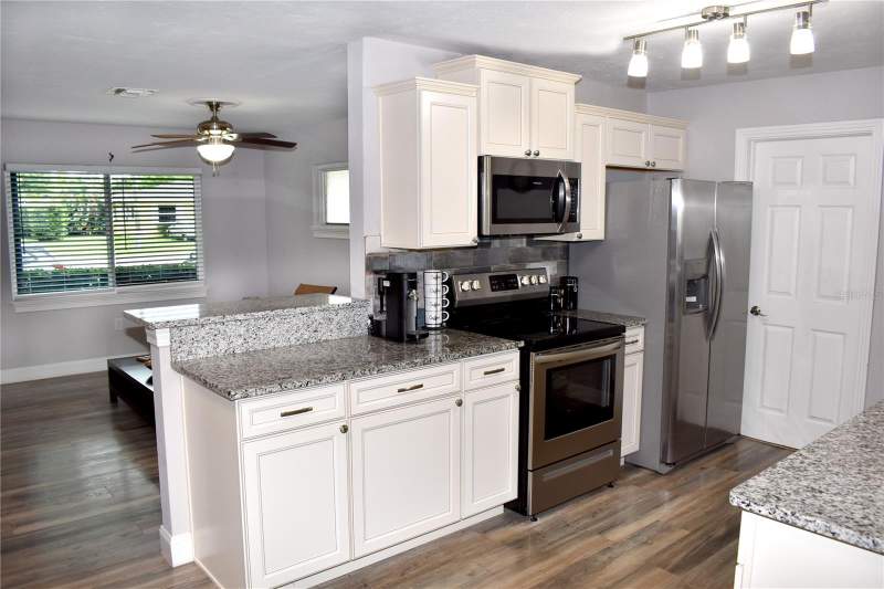 4 bedroom Single Family Residence at 110 Royal Palms, Meadow Lake Sub Lot 45, Largo — photo 5