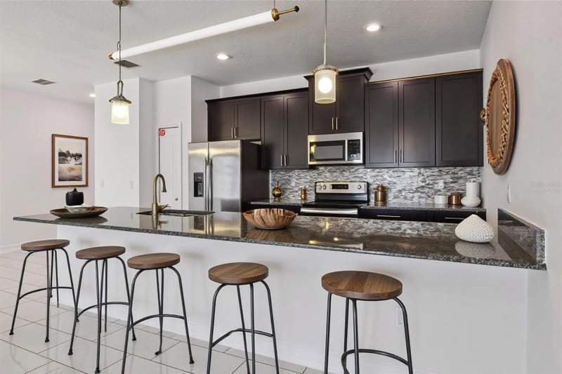 4 bedroom Townhouse at 1584 Slice Way, Stoneybrook South Ph I-1 & J-1, Davenport — photo 3