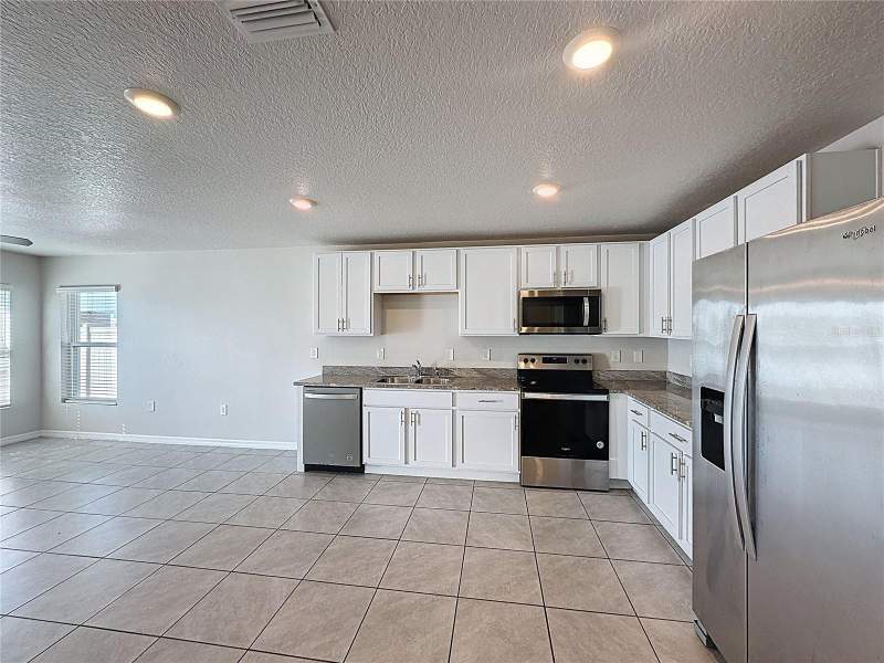4 bedroom Single Family Residence at 12167 High Rock Way, Bella Lago Ph I, Parrish — photo 3