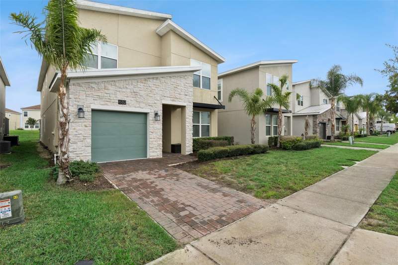 5 bedroom Single Family Residence at 682 Whistling Straits Boulevard, Championsgate, Stoneybrook, Davenport — photo 2