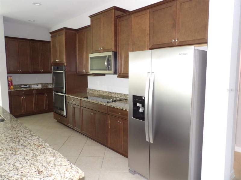 4 bedroom Single Family Residence at 11940 Sunburst Marble Road, South Fork Tr Q Ph 1, Riverview — photo 5