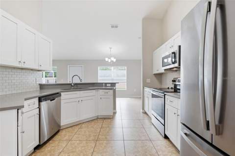 2442 Ambassador Avenue, Spring Hill FL - photo 10 of 32