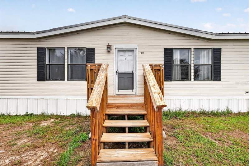 5 bedroom Manufactured Home at 311 SE Highway 42, Foxborough Farms, Summerfield — photo 4