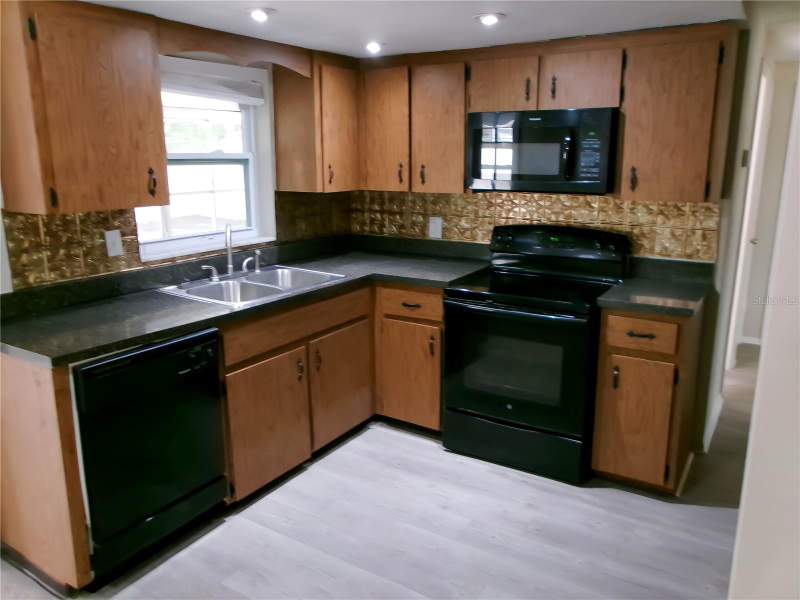 3 bedroom Single Family Residence at 1421 Normandy Boulevard, Holiday Lake Estates, Holiday — photo 4