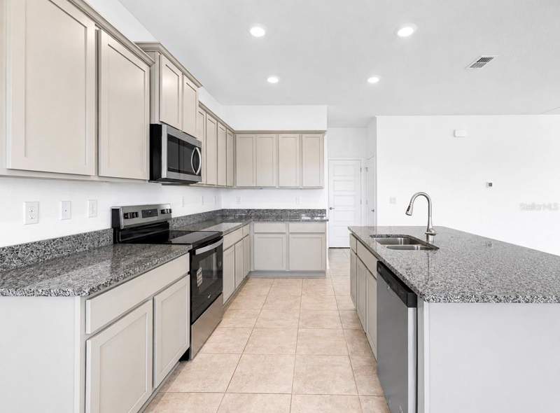 4 bedroom Single Family Residence at 7575 Bent Tree Loop, Harmony Central Ph 2, Harmony — photo 5