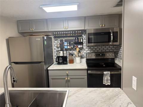 315 Medallion Boulevard #H, Madeira Beach FL - photo 9 of 61