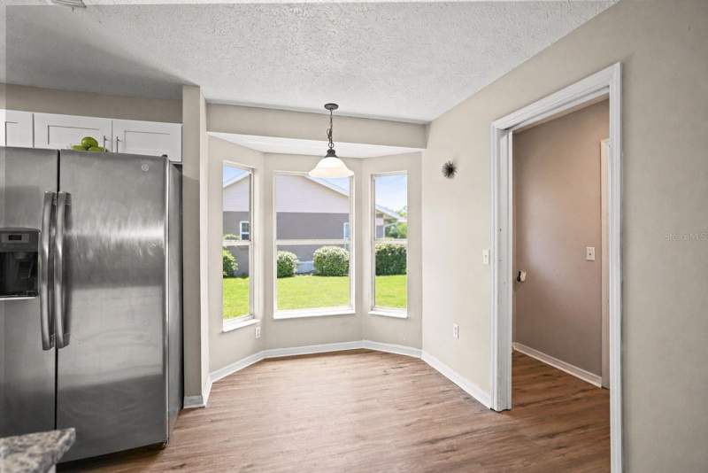 3 bedroom Single Family Residence at 13200 Titleist Drive, Wood View At Meadow Oaks, Hudson — photo 3
