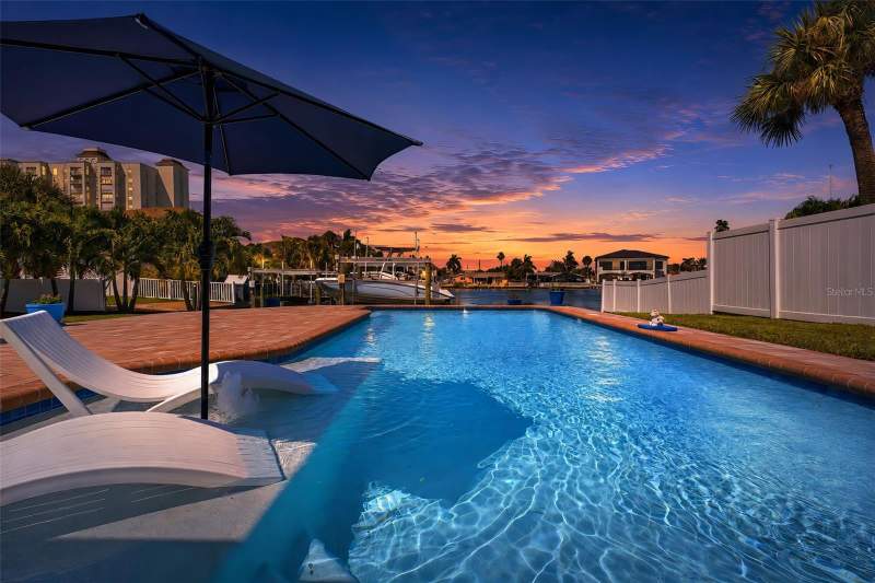 4 bedroom Single Family Residence at 6414 2nd Palm Point, Three Palms Point, St Pete Beach — photo 4