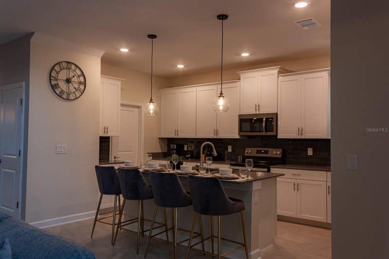 5 bedroom Single Family Residence at 801 Drop Shot Drive, Stoneybrook South North Prcl Ph 3, Davenport — photo 5