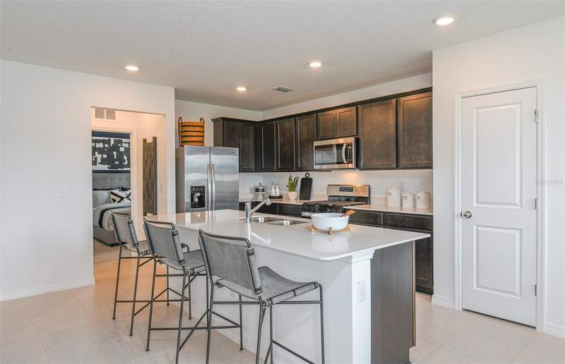 5 bedroom Single Family Residence at 9911 Trellis Vine Way, Oakfield Trails Phase I, Parrish — photo 5