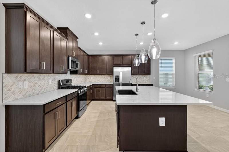 4 bedroom Single Family Residence at 5166 Goldfinch Drive, The Waters At Center Lake Ranch, St Cloud — photo 4
