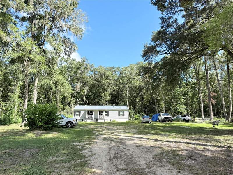3 bedroom Manufactured Home at 12051 NW 7th Place, Meadow Wood Acres, Ocala — photo 2