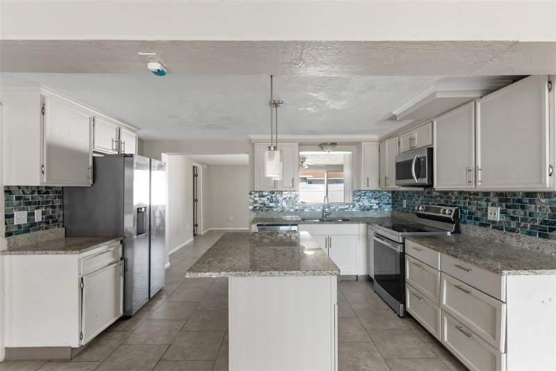 4 bedroom Single Family Residence at 2344 Tahitian Drive, Tahitian Homes, Holiday — photo 4