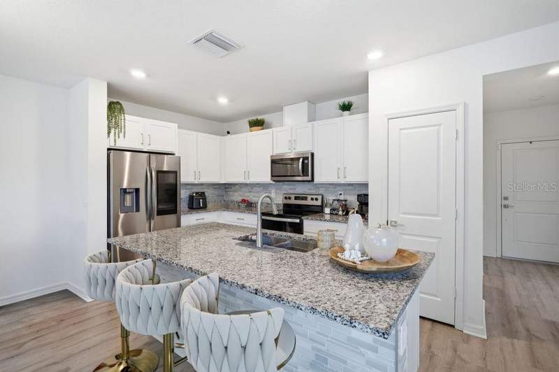 3 bedroom Townhouse at 9418 WESTSIDE HILLS DRIVE, BELLAVIVA PH 4, DAVENPORT — photo 5