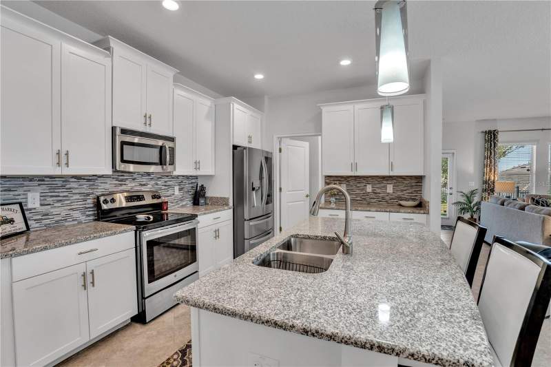 4 bedroom Single Family Residence at 1419 Pro Shop Ct, Stoneybrook South Ph F-1, Davenport — photo 4