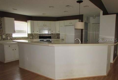 1142 Meadowbend Drive, Leesburg FL - photo 8 of 14