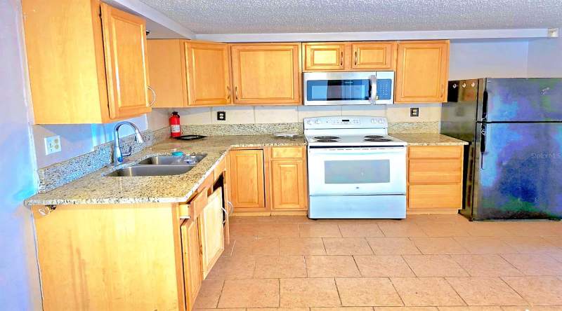 2 bedroom Single Family Residence at 3806 Baden Drive, Tahitian Homes, Holiday — photo 2