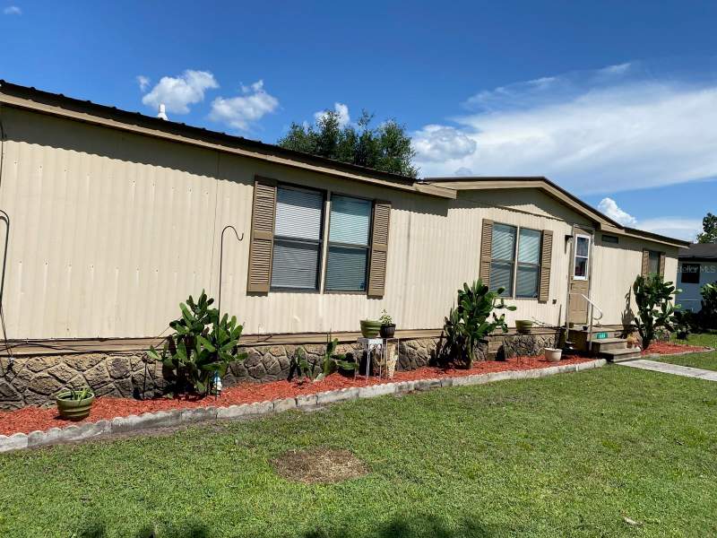 4 bedroom Manufactured Home at 1855 BRAMBLEWOOD DRIVE, KANUGA VILLAGE MOBILE HOME PARK PH 2, ST CLOUD — photo 1