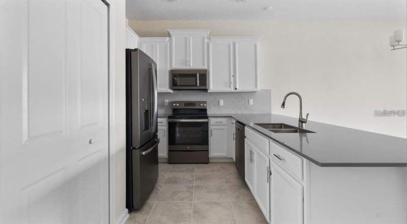 2 bedroom Condominium at 857 OCEAN COURSE AVENUE #857, CHAMPIONSGATE PH 3, DAVENPORT — photo 3