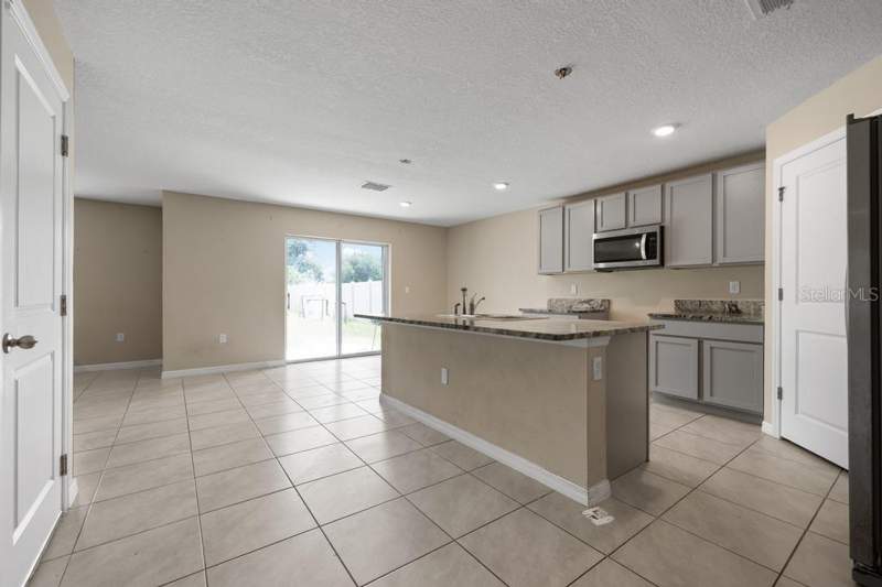 4 bedroom Single Family Residence at 5280 Fiddle Fig Avenue, Berry Bay Sub, Wimauma — photo 5