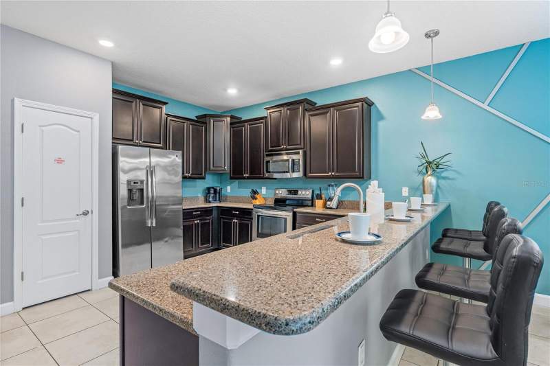 9 bedroom Single Family Residence at 9158 Wedge Drive, Stoneybrook South Ph G-1, Davenport — photo 2