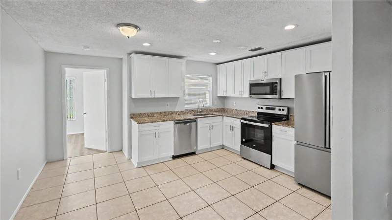 4 bedroom Single Family Residence at 7419 Ivory Terrace, Seven Spgs Homes, New Port Richey — photo 4