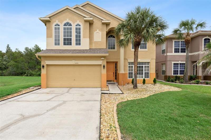 5 bedroom Single Family Residence at 1860 WHITE HERON BAY CIRCLE, HERON BAY AT MEADOW WOODS 44/54, ORLANDO — photo 1