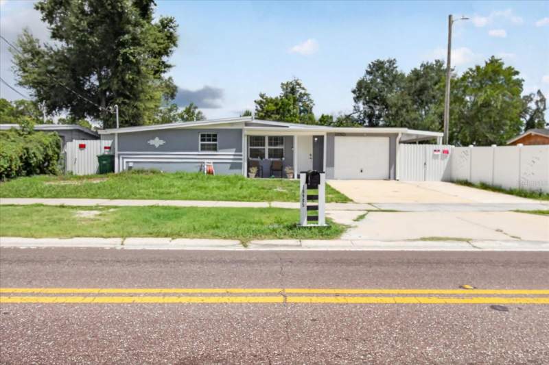 4 bedroom Single Family Residence at 10905 N 22nd Street, Sherwood Heights Unit 1, Tampa — photo 2