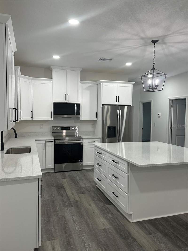 4 bedroom Single Family Residence at 13311 MIDWAY AVENUE, ASTATULA MONROE PARK, ASTATULA — photo 5