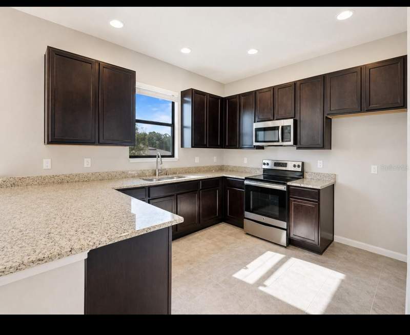 4 bedroom Single Family Residence at 9175 Chandler Drive, Cypress Oaks Ph 1, Groveland — photo 4