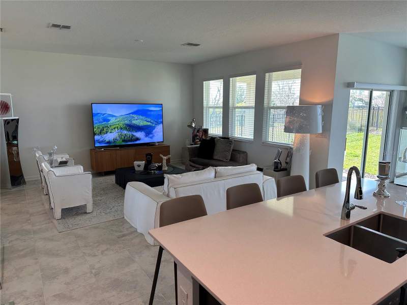 4 bedroom Single Family Residence at 8946 Fluffy Lie Court, Stoneybrook South North Prcl Ph 5, Davenport — photo 5
