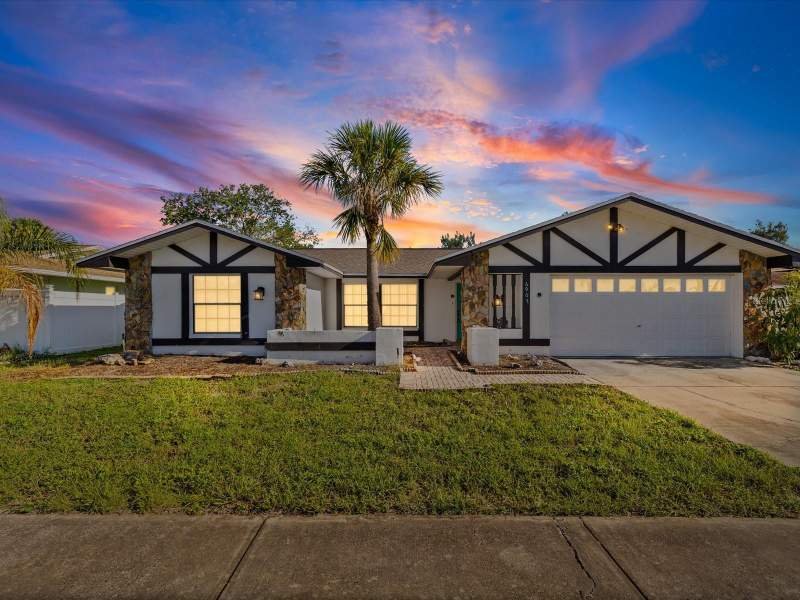 6907 BOTTLE BRUSH DRIVE home for sale in Orchid Lake Village
