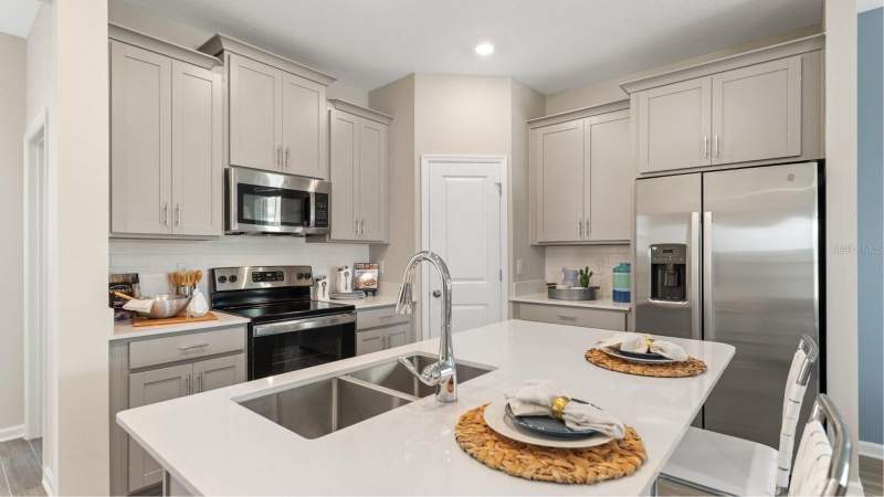 4 bedroom Single Family Residence at 5650 Kettlebell Alley, Wellness Way 32S, Clermont — photo 3
