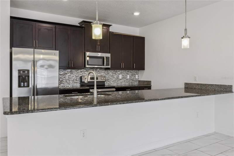 4 bedroom Townhouse at 1584 Slice Way, Stoneybrook South Ph I-1 & J-1, Davenport — photo 5