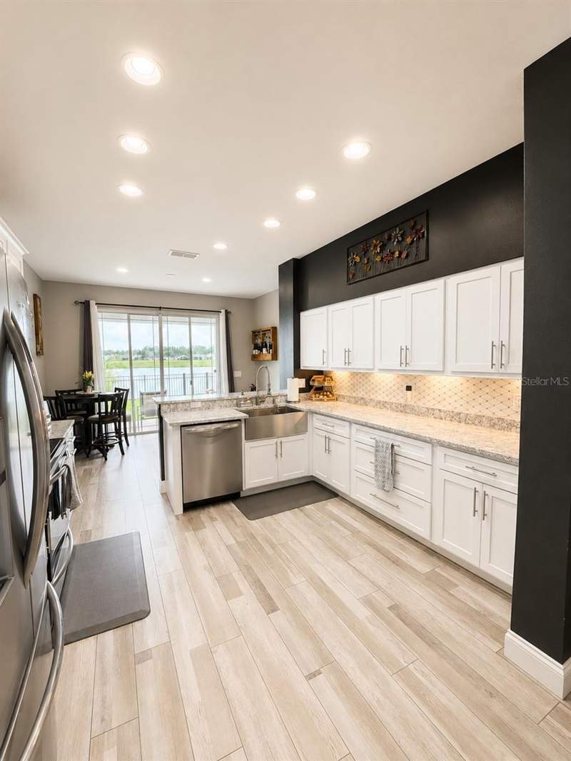 4 bedroom Single Family Residence at 9880 TIVOLI CHASE DRIVE, TIVOLI WOODS VILLAGE B 51 74, ORLANDO — photo 5