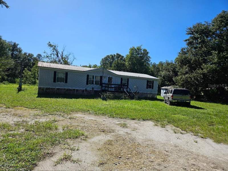 4 bedroom Manufactured Home at 12430 Country Place Road, Rockridge Farmettes, Lakeland — photo 2