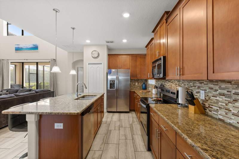 5 bedroom Single Family Residence at 5493 Solterra Circle, Solterra Ph 1, Davenport — photo 5