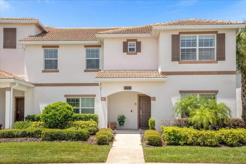 5 bedroom Townhouse at 8997 Stinger Drive, Stoneybrook South Ph J-2 & J-3, Davenport — photo 1