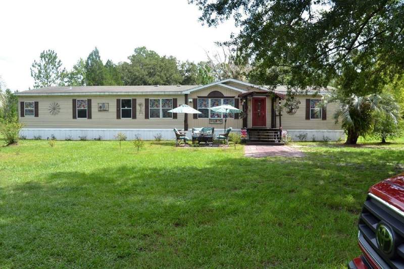 4 bedroom Manufactured Home at 13921 PINE MEADOW ROAD, PINE MEADOW ACRES, KATHLEEN — photo 1