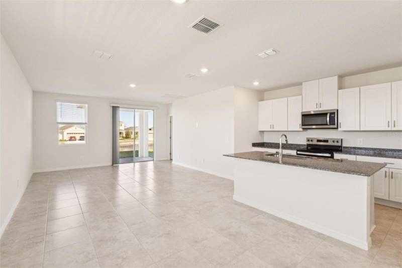 4 bedroom Single Family Residence at 879 Sunshower Drive, The Reserve At Hammock Oaks, Lady Lake — photo 4