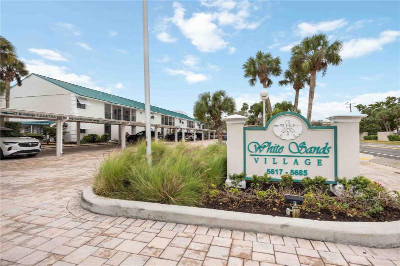 5673 MIDNIGHT PASS ROAD #202 home for sale in White Sands Village