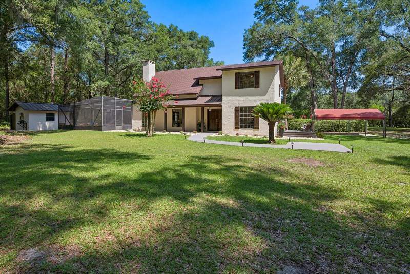 5 bedroom Single Family Residence at 22110 SW 15th Avenue, Hunt Estates, Newberry — photo 2